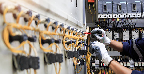 Professional Electrician technician working in Davenport, IA